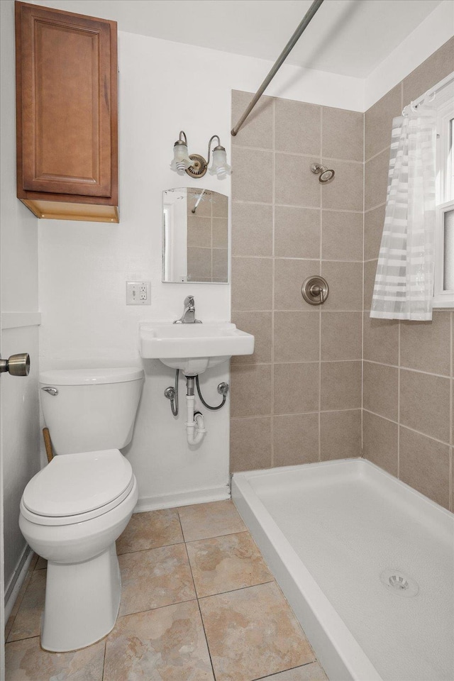 2608 E Heroy Ave, Spokane, WA 99207 - full bathroom with a shower stall and tile patterned floors
