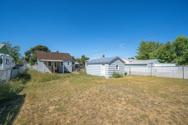 2608 E Heroy Ave, Spokane, WA 99207 - fenced backyard featuring an outdoor structure
