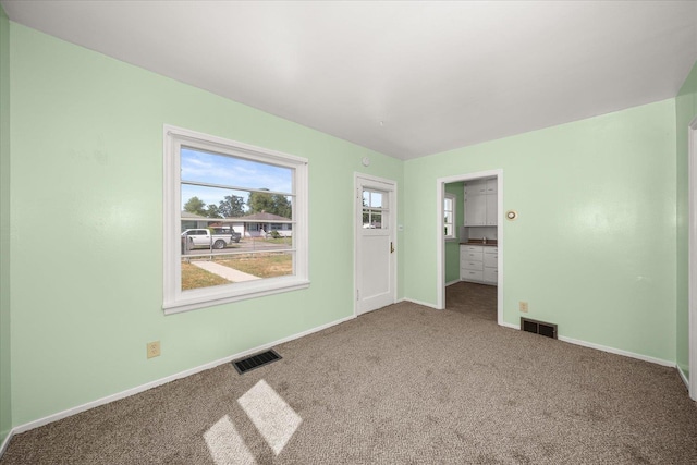 2608 E Heroy Ave, Spokane, WA 99207 - unfurnished room with carpet flooring and baseboards