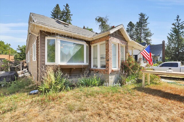 452 W 26th Ave, Spokane, WA 99203 - view of side of property featuring brick siding