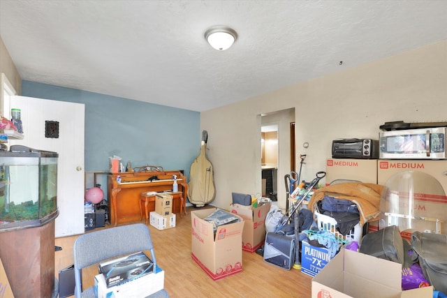 452 W 26th Ave, Spokane, WA 99203 - bedroom with wood finished floors and a textured ceiling