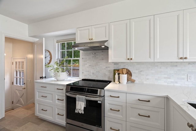 818 W 27th Ave, Spokane, WA 99203 - kitchen with stainless steel range with electric stovetop, white cabinetry, and decorative backsplash