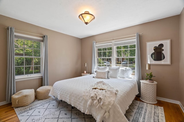 818 W 27th Ave, Spokane, WA 99203 - bedroom featuring baseboards and wood finished floors