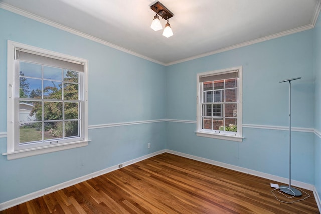 818 W 27th Ave, Spokane, WA 99203 - empty room with plenty of natural light, dark wood-style floors, and ornamental molding