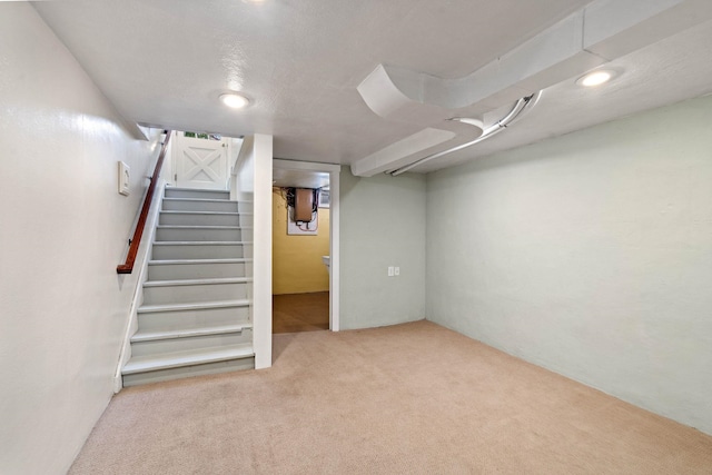 818 W 27th Ave, Spokane, WA 99203 - finished below grade area featuring carpet flooring, recessed lighting, and stairway