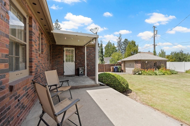 818 W 27th Ave, Spokane, WA 99203 - view of patio / terrace with an outbuilding and a garage