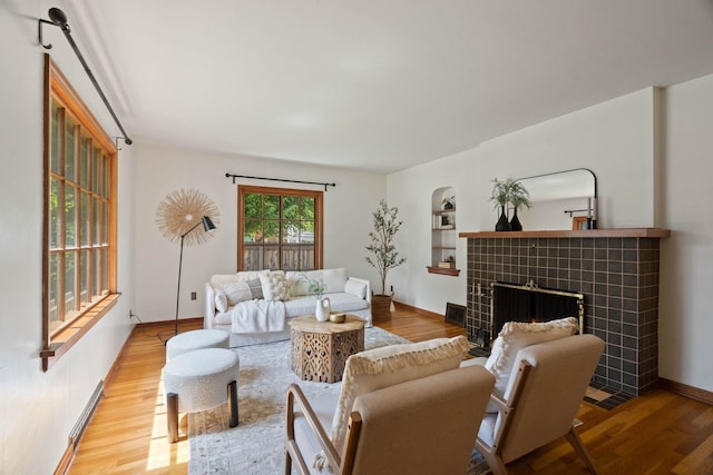 818 W 27th Ave, Spokane, WA 99203 - living area featuring wood finished floors and a tile fireplace