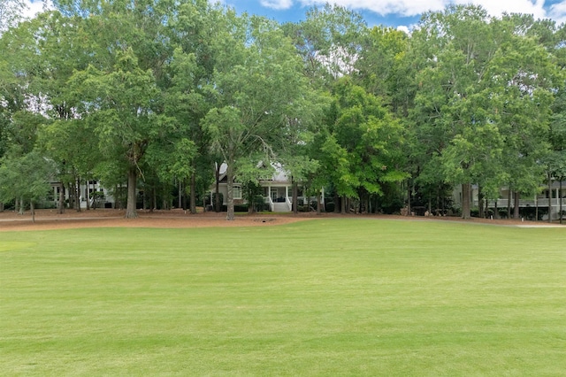 surrounding community with a lawn