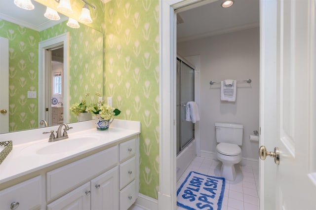 full bathroom with tile patterned flooring, vanity, bath / shower combo with glass door, and ornamental molding