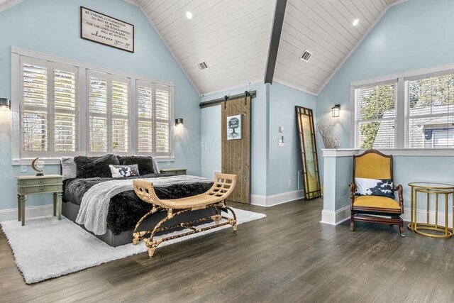 1611 Lighthouse Cir, Greensboro, GA 30642 - bedroom with baseboards, high vaulted ceiling, a barn door, and wood finished floors