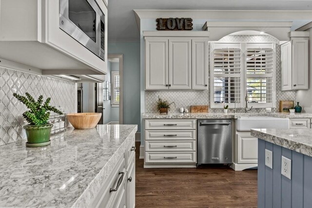 1611 Lighthouse Cir, Greensboro, GA 30642 - kitchen with white cabinets, stainless steel appliances, dark wood-style floors, and decorative backsplash
