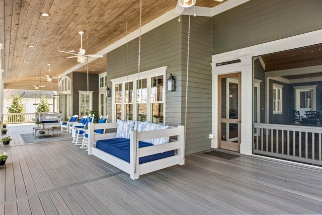 1611 Lighthouse Cir, Greensboro, GA 30642 - wooden deck with outdoor lounge area and ceiling fan