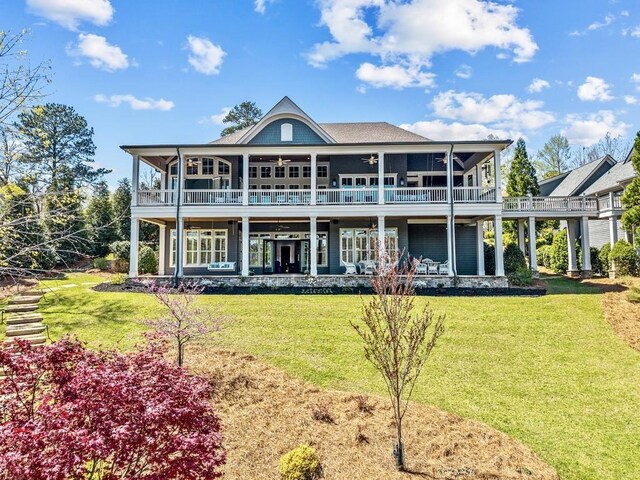 1611 Lighthouse Cir, Greensboro, GA 30642 - back of house featuring a lawn and ceiling fan