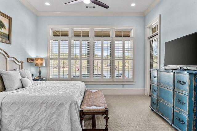 1611 Lighthouse Cir, Greensboro, GA 30642 - bedroom with visible vents, crown molding, baseboards, ceiling fan, and carpet floors