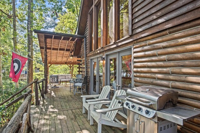 wooden terrace with grilling area