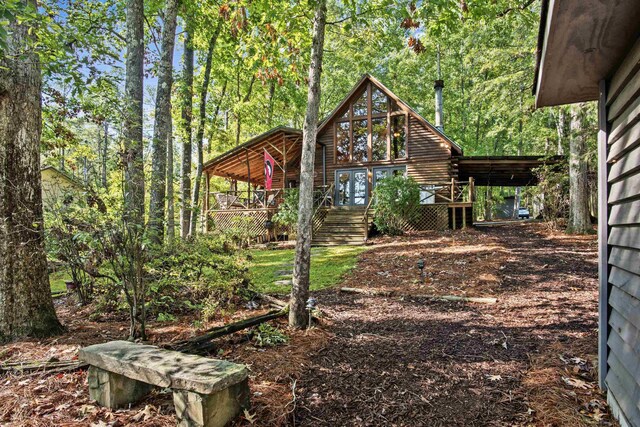 view of yard featuring a deck