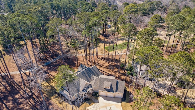 bird's eye view with a forest view