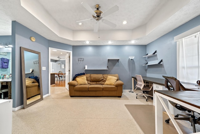 office area with recessed lighting, a ceiling fan, baseboards, and light carpet