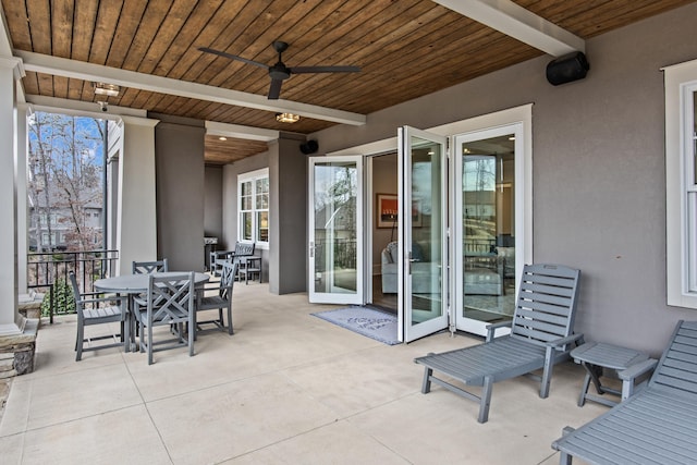 view of patio featuring ceiling fan