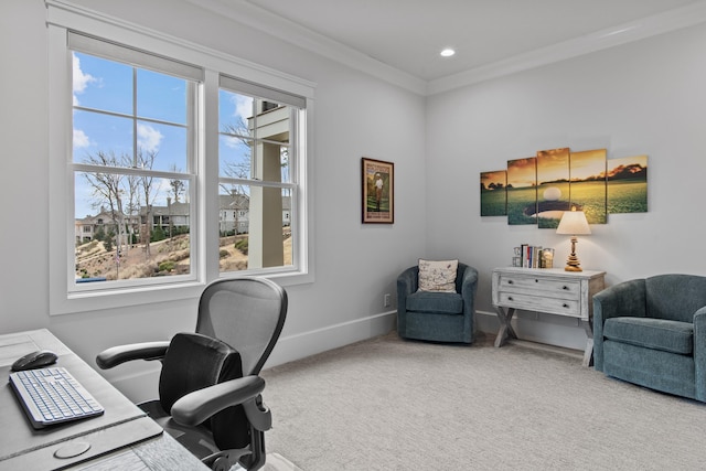 office area with ornamental molding and carpet