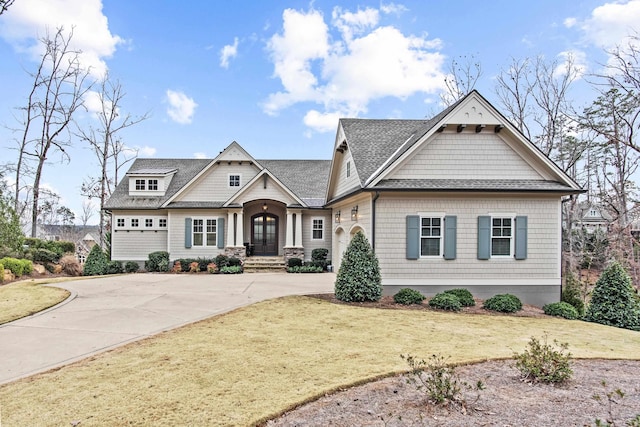 craftsman-style home with a front lawn