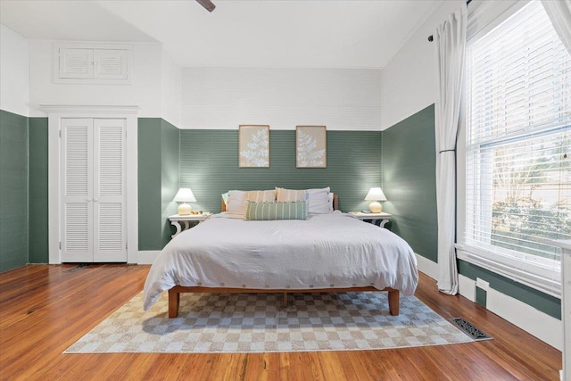 bedroom with wood-type flooring