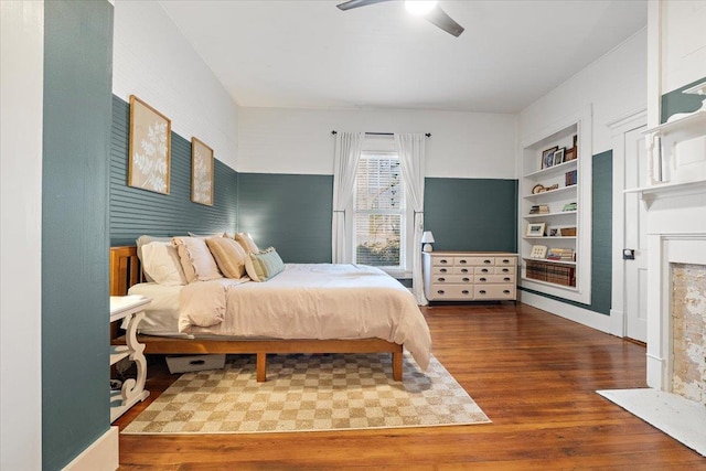 bedroom featuring wood-type flooring and ceiling fan