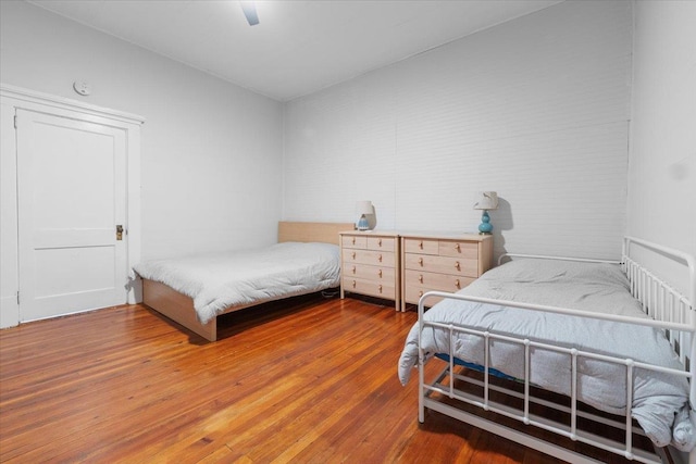 bedroom featuring wood-type flooring and ceiling fan