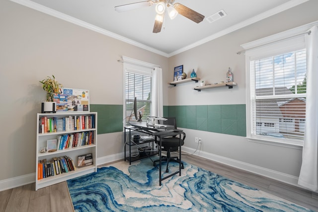 office with crown molding, hardwood / wood-style flooring, and ceiling fan