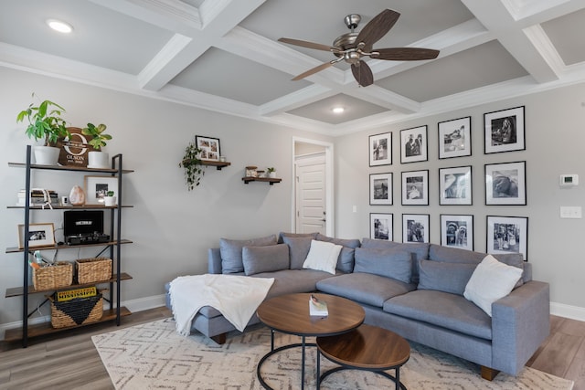 living room with coffered ceiling, hardwood / wood-style floors, beam ceiling, and ceiling fan