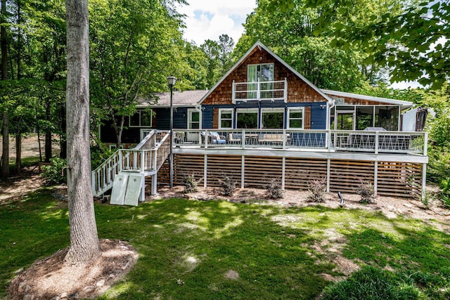 150 Possum Point Dr, Eatonton, GA 31024 - rear view of house with stairs, a yard, and a deck