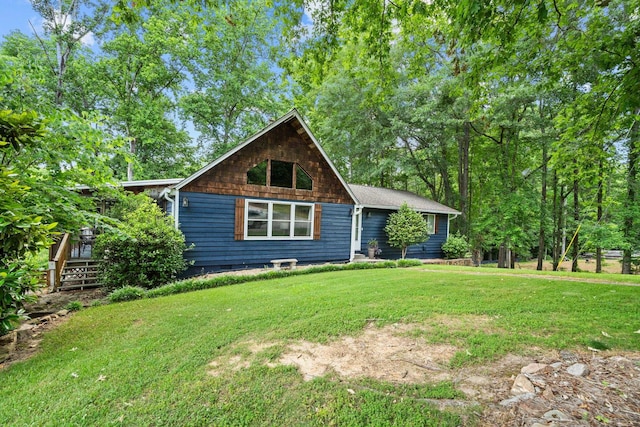 150 Possum Point Dr, Eatonton, GA 31024 - chalet / cabin featuring a front yard and a deck