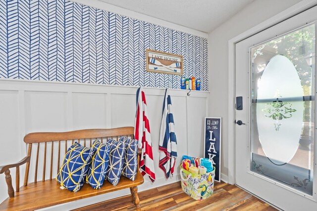 150 Possum Point Dr, Eatonton, GA 31024 - mudroom with wood finished floors, a decorative wall, and wallpapered walls