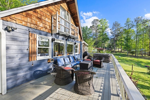 150 Possum Point Dr, Eatonton, GA 31024 - wooden terrace featuring outdoor lounge area and a lawn