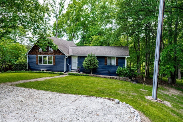 150 Possum Point Dr, Eatonton, GA 31024 - view of front facade with roof with shingles and a front lawn