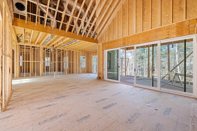 misc room with a high ceiling and a wealth of natural light