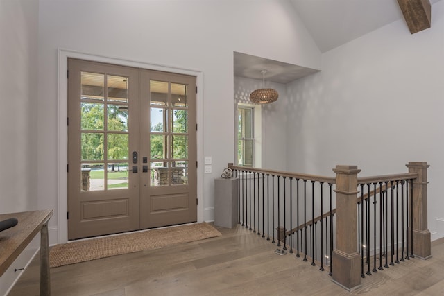 1010 Thorton Crk, Greensboro, GA 30642 - doorway to outside featuring wood finished floors, french doors, baseboards, and high vaulted ceiling