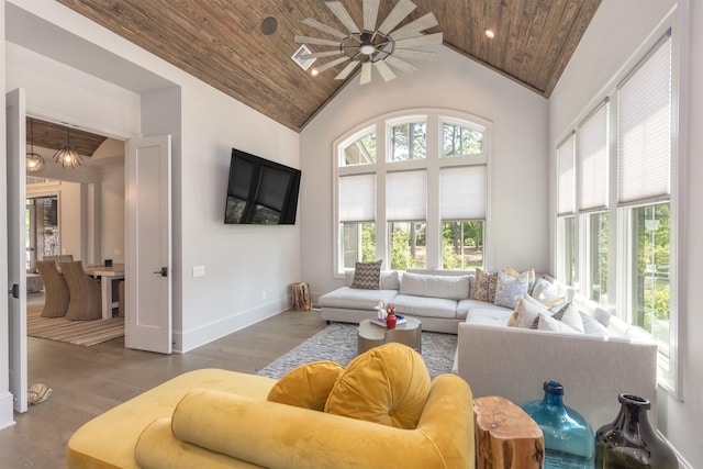 1010 Thorton Crk, Greensboro, GA 30642 - living area featuring wooden ceiling, high vaulted ceiling, wood finished floors, and baseboards