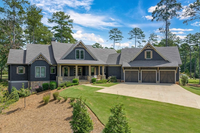 1010 Thorton Crk, Greensboro, GA 30642 - view of front of home featuring driveway, covered porch, a front yard, a garage, and a chimney
