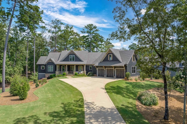 1010 Thorton Crk, Greensboro, GA 30642 - craftsman house featuring concrete driveway, a front yard, a chimney, and stone siding
