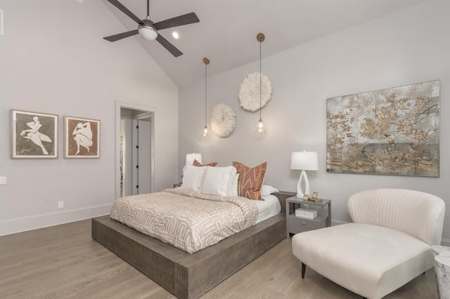1010 Thorton Crk, Greensboro, GA 30642 - bedroom with high vaulted ceiling, wood finished floors, baseboards, and a ceiling fan