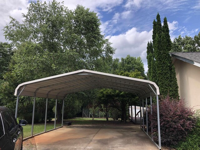 104 Wesley Ln, Eatonton, GA 31024 - view of vehicle parking featuring a carport