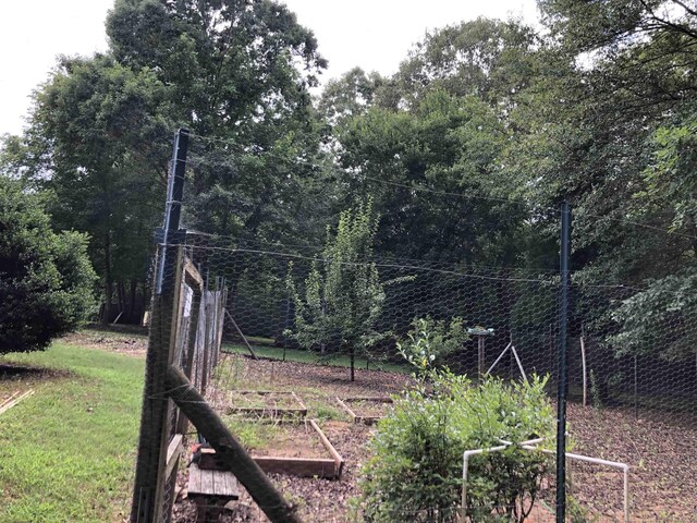 104 Wesley Ln, Eatonton, GA 31024 - view of yard with a garden