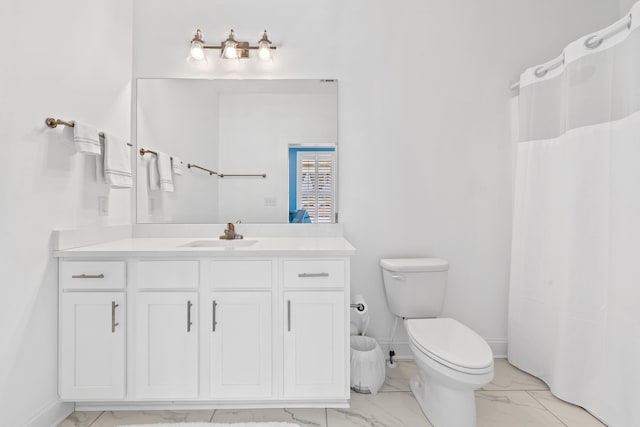 full bathroom with vanity, baseboards, curtained shower, toilet, and marble finish floor
