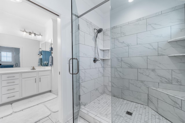full bath featuring a shower stall and vanity