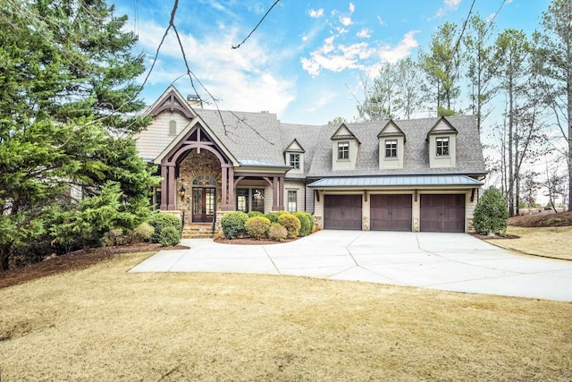 1030 Ridge Grove Ct, Greensboro, GA 30642 - view of front of house with a garage, driveway, a front yard, and a standing seam roof