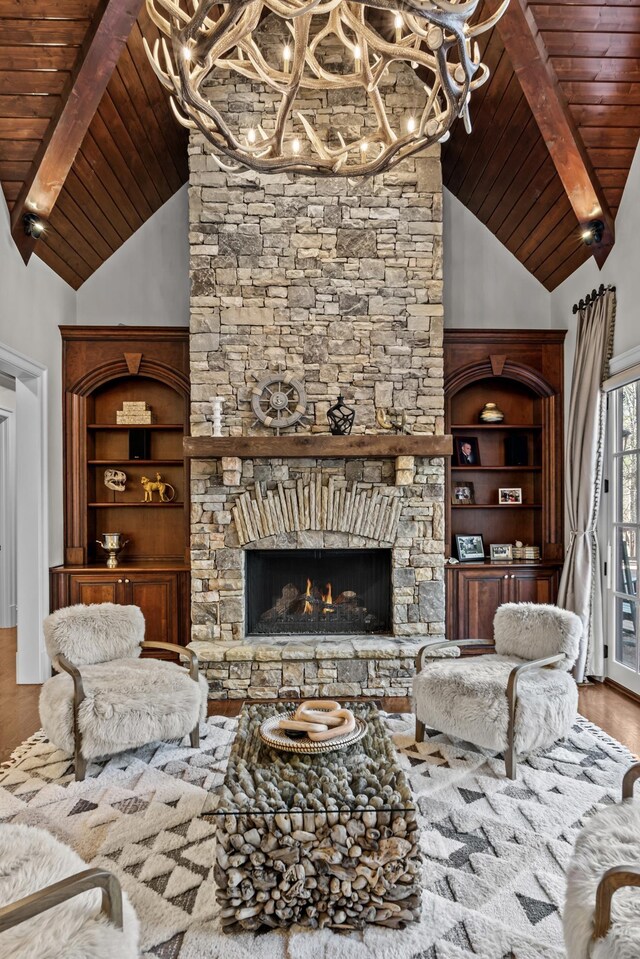 1030 Ridge Grove Ct, Greensboro, GA 30642 - living room with wood finished floors, high vaulted ceiling, beam ceiling, a notable chandelier, and wooden ceiling