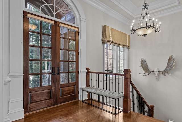 1030 Ridge Grove Ct, Greensboro, GA 30642 - doorway to outside with french doors, a chandelier, crown molding, and wood finished floors