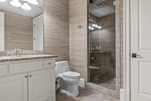 bathroom featuring toilet, tile walls, vanity, and walk in shower