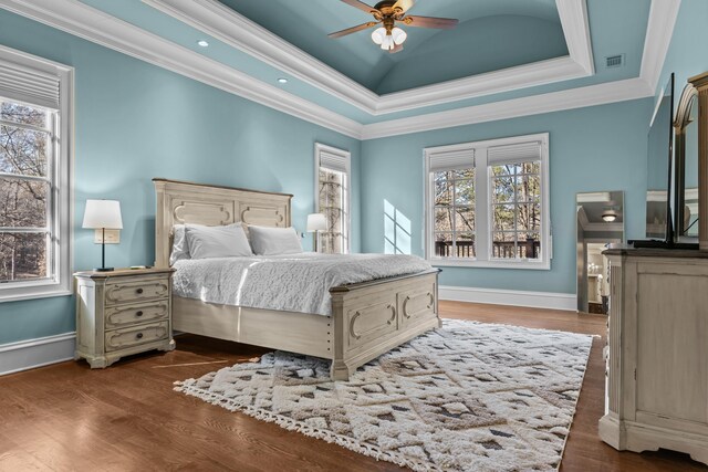 1030 Ridge Grove Ct, Greensboro, GA 30642 - bedroom with a tray ceiling, wood finished floors, and ornamental molding
